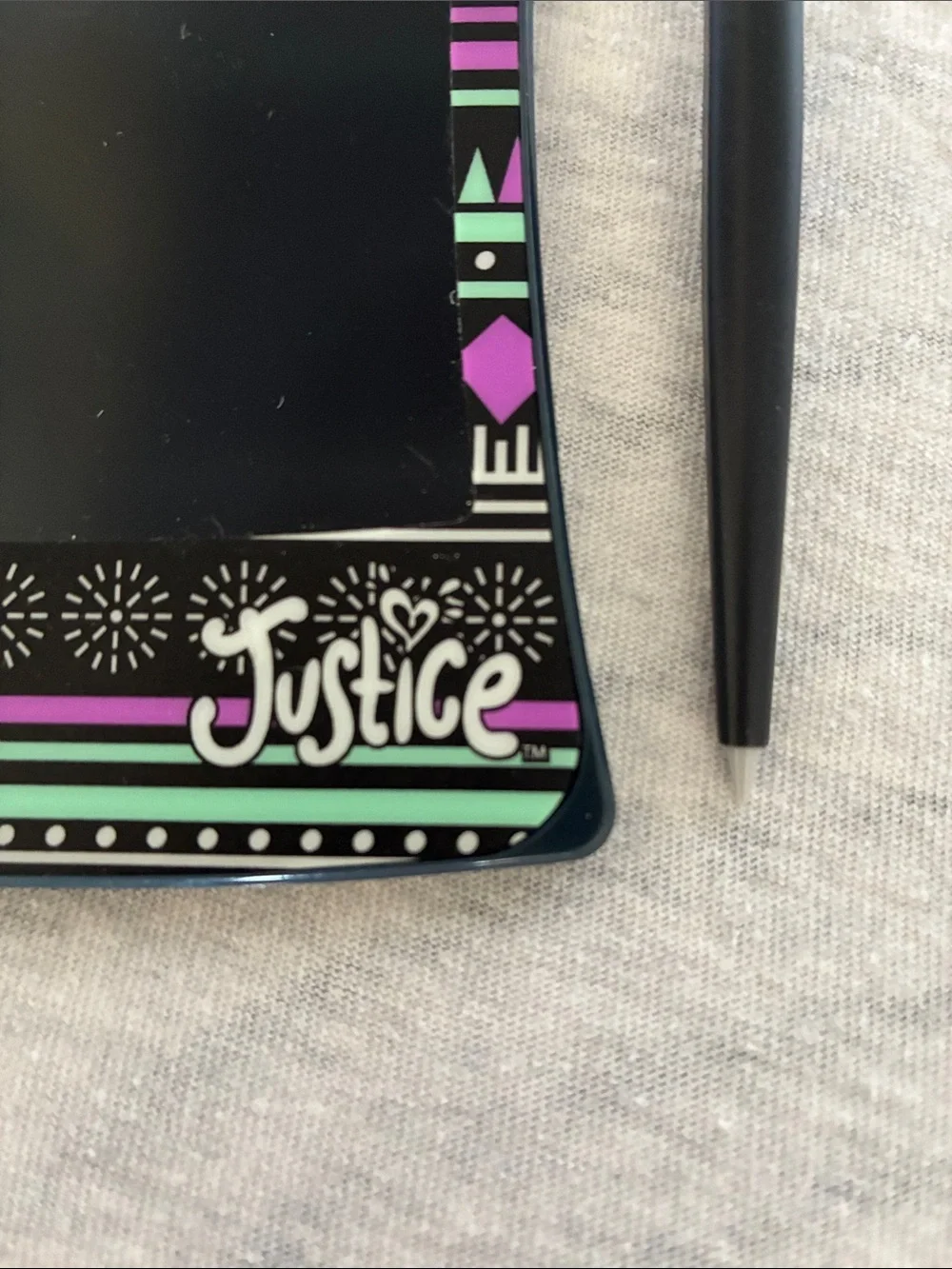 Justice Black LCD Doodle Tablet with Mint Green and Purple Accents